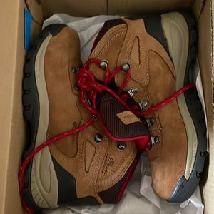 New and box light weight hiking boots. Wore only to try on .
